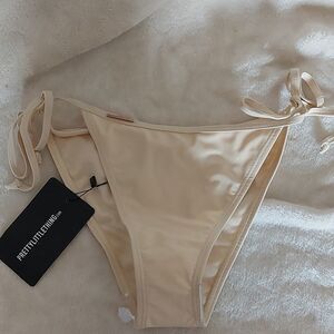 Pretty Little Thing NWT bikini bottoms sz. 4
